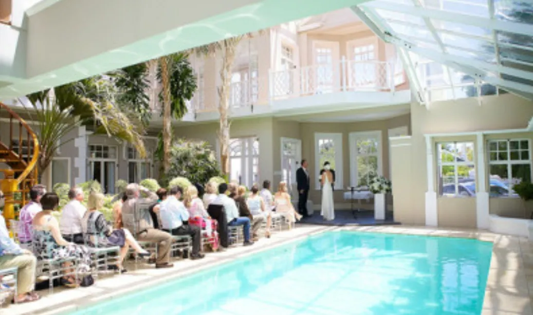 Wedding ceremony beside the atrium pool