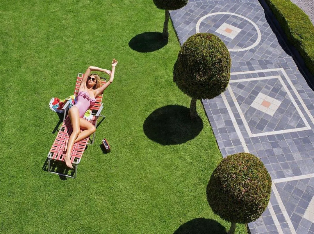 Sunbathing on the front lawn at Banksia Boutique