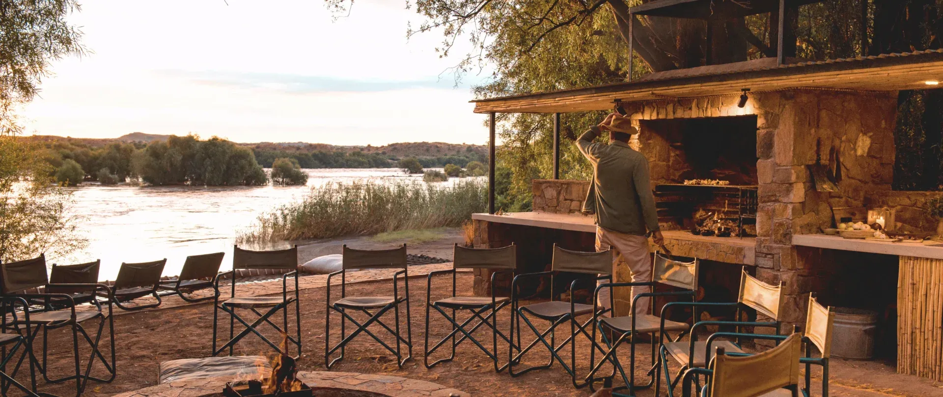 The riverside fire and outdoor seating at Egerton Farm