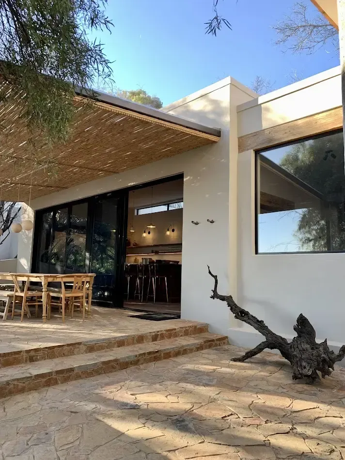 The River House patio and outdoor dining area