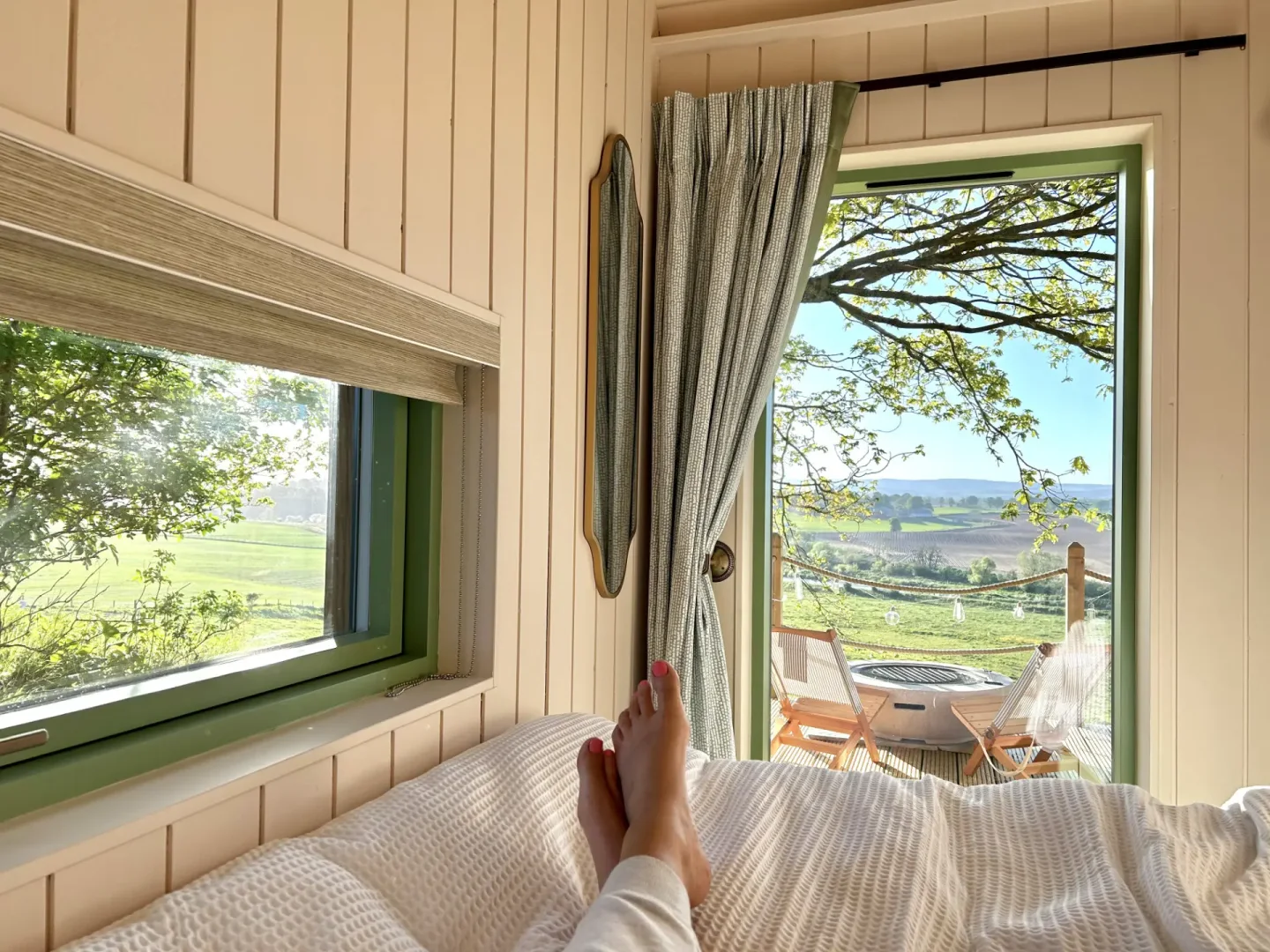 The countryside view from Fairlight's bed