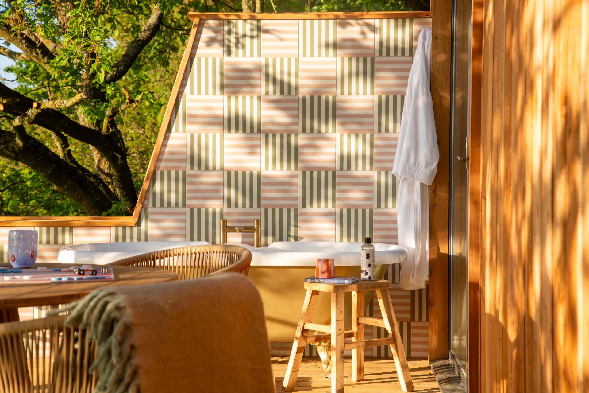 Fairlight's outdoor bath against a chequered tiled wall