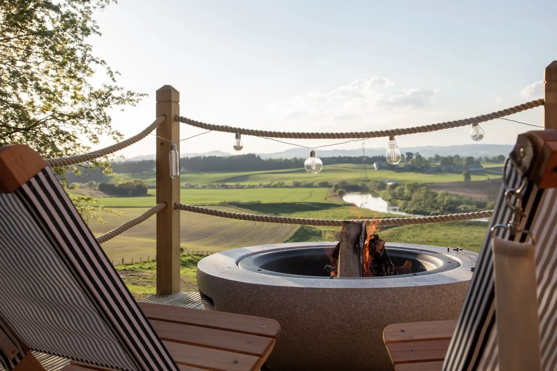 The fire pit on Milkwood's deck overlooking the River Isla