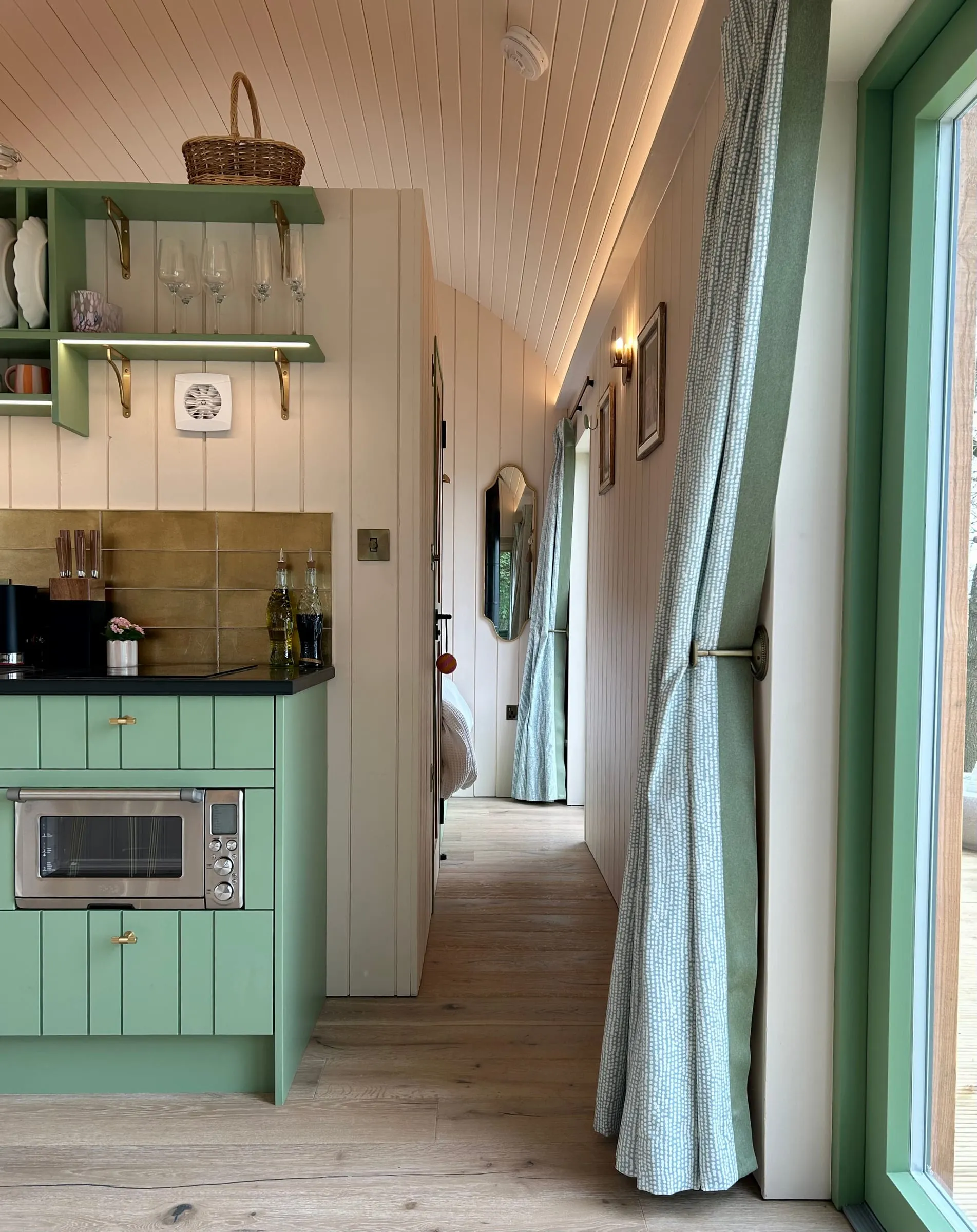 Fairlight's green kitchen and hallway