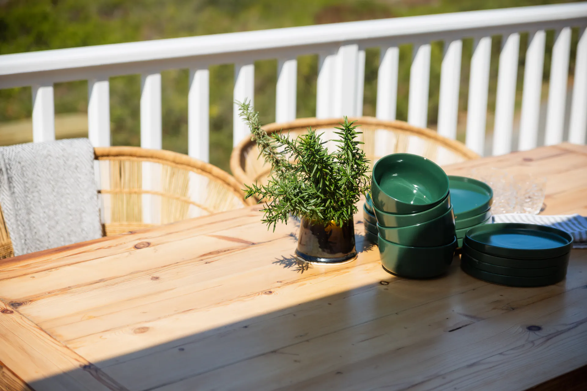 Outdoor dining table on the Sea Facing Apartment balcony