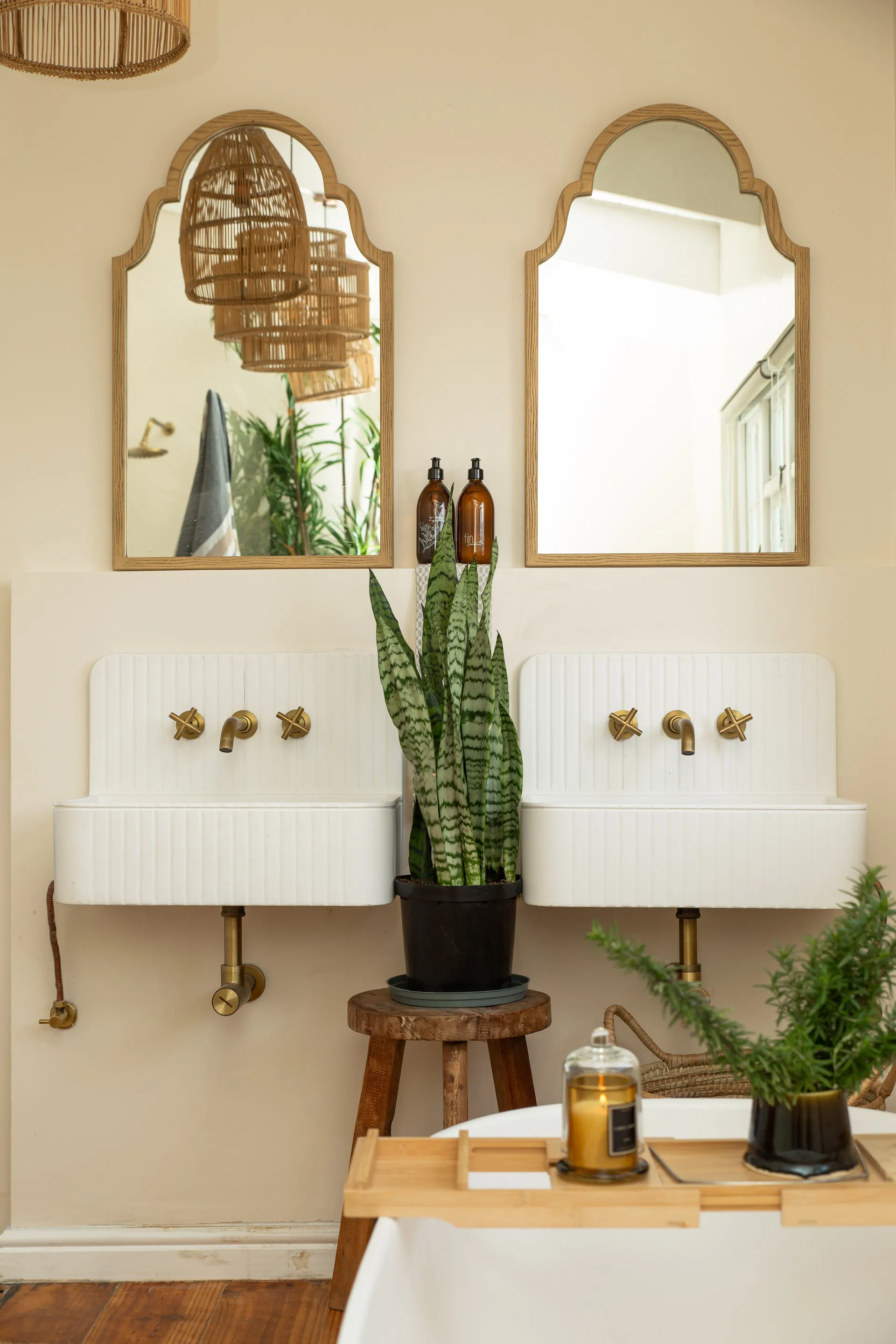 Fluted twin basins and brass taps in a Little Villa Hermanus bathroom