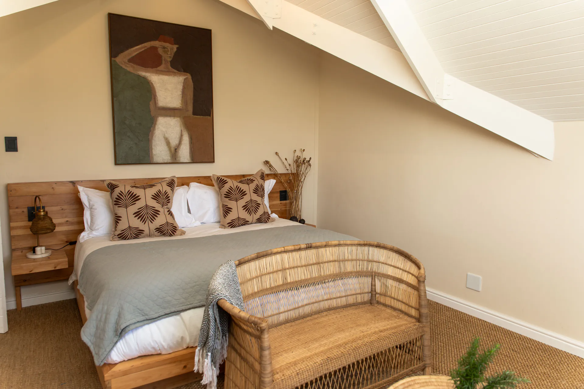 Sea Facing Apartment bed with rattan seating at the foot