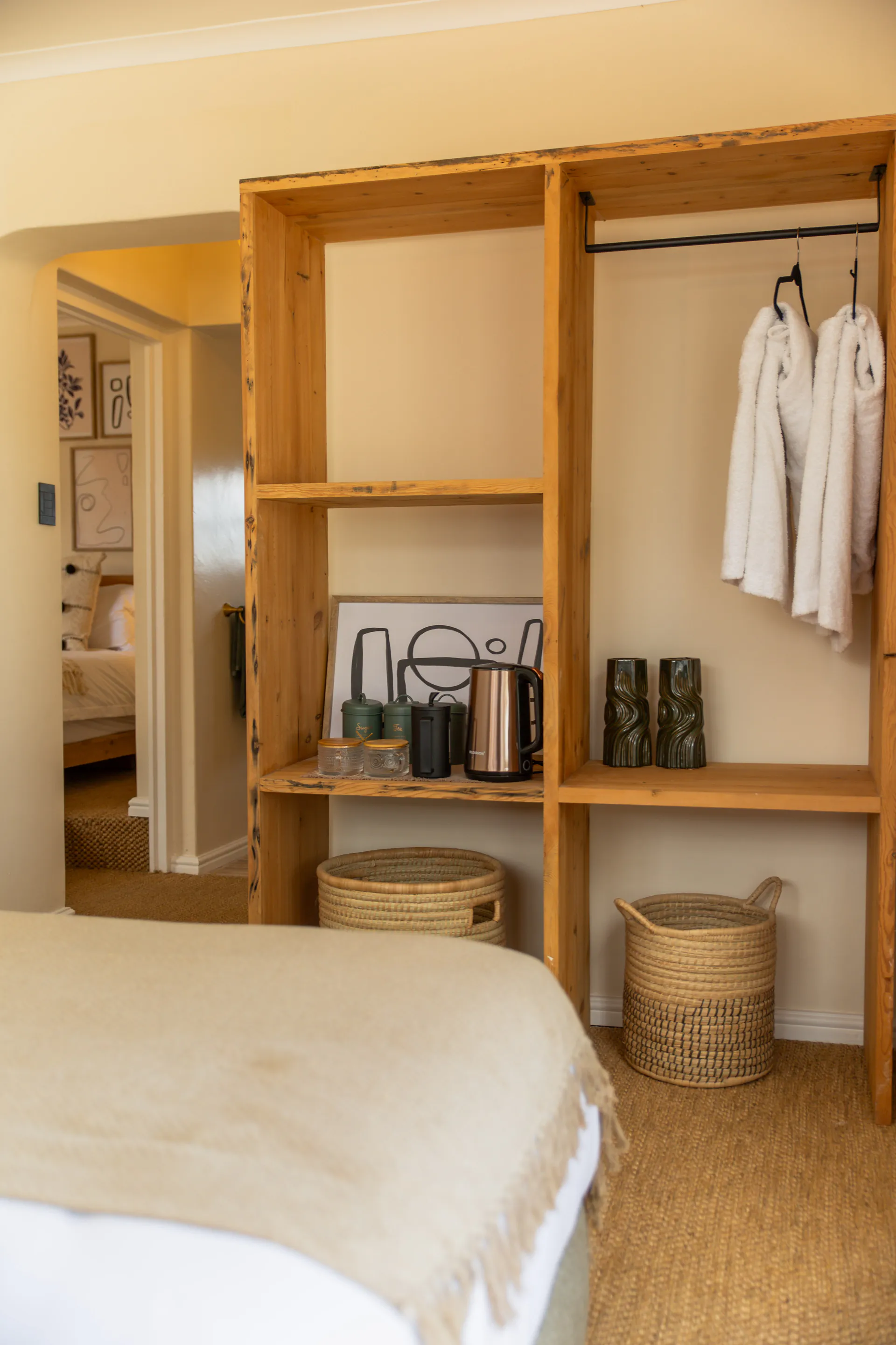 Family Room wardrobe, robes and tea station