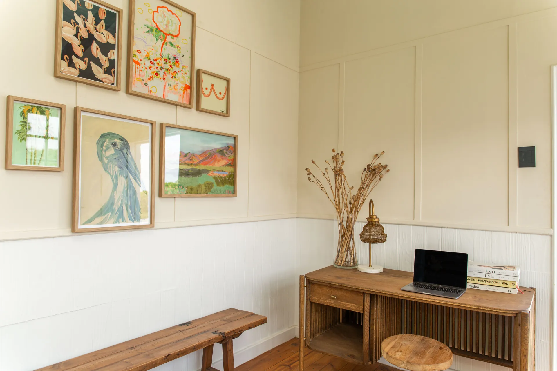 Workspace nook with gallery wall in the Sea Facing Apartment