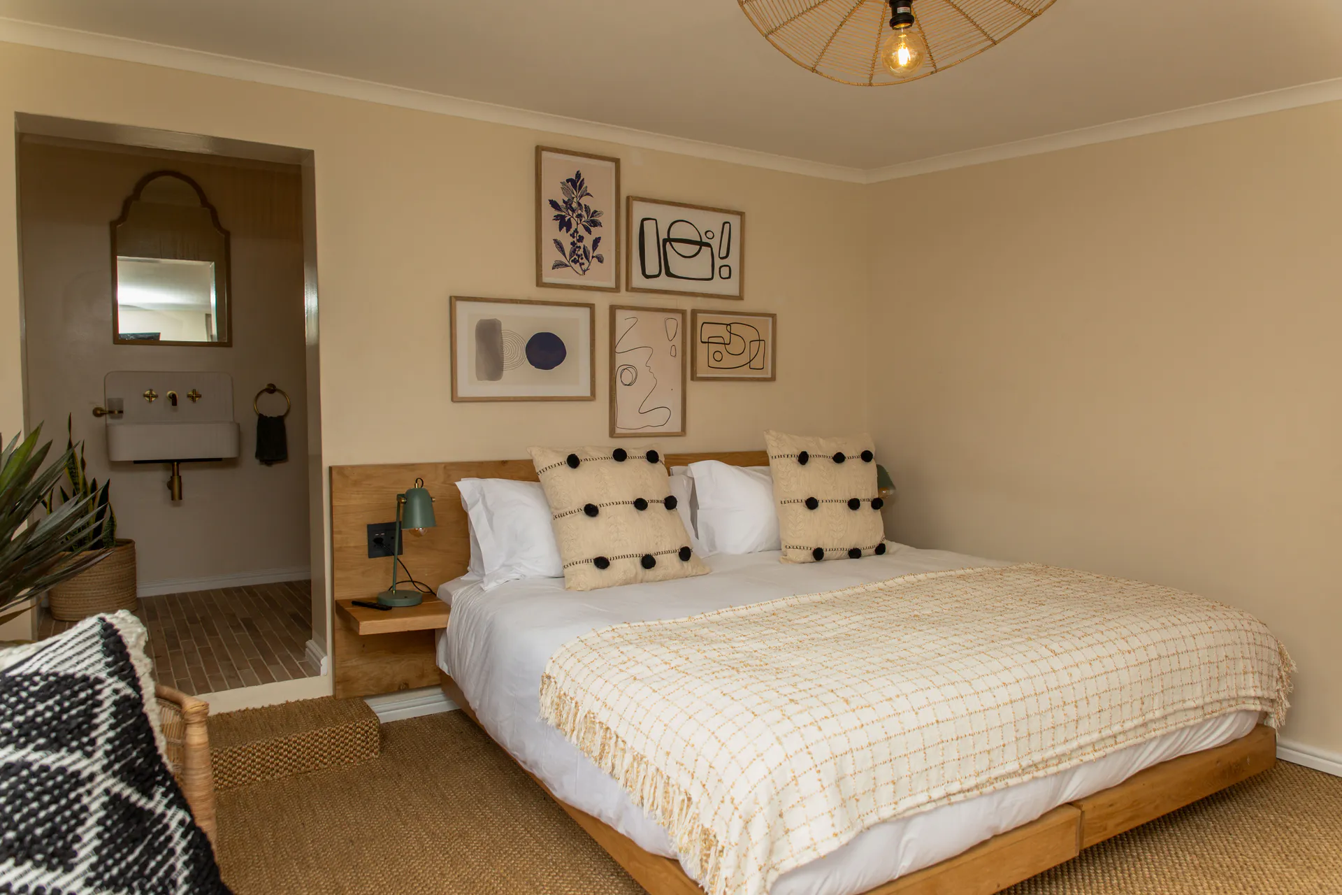 Standard Garden Room bed looking toward the en-suite
