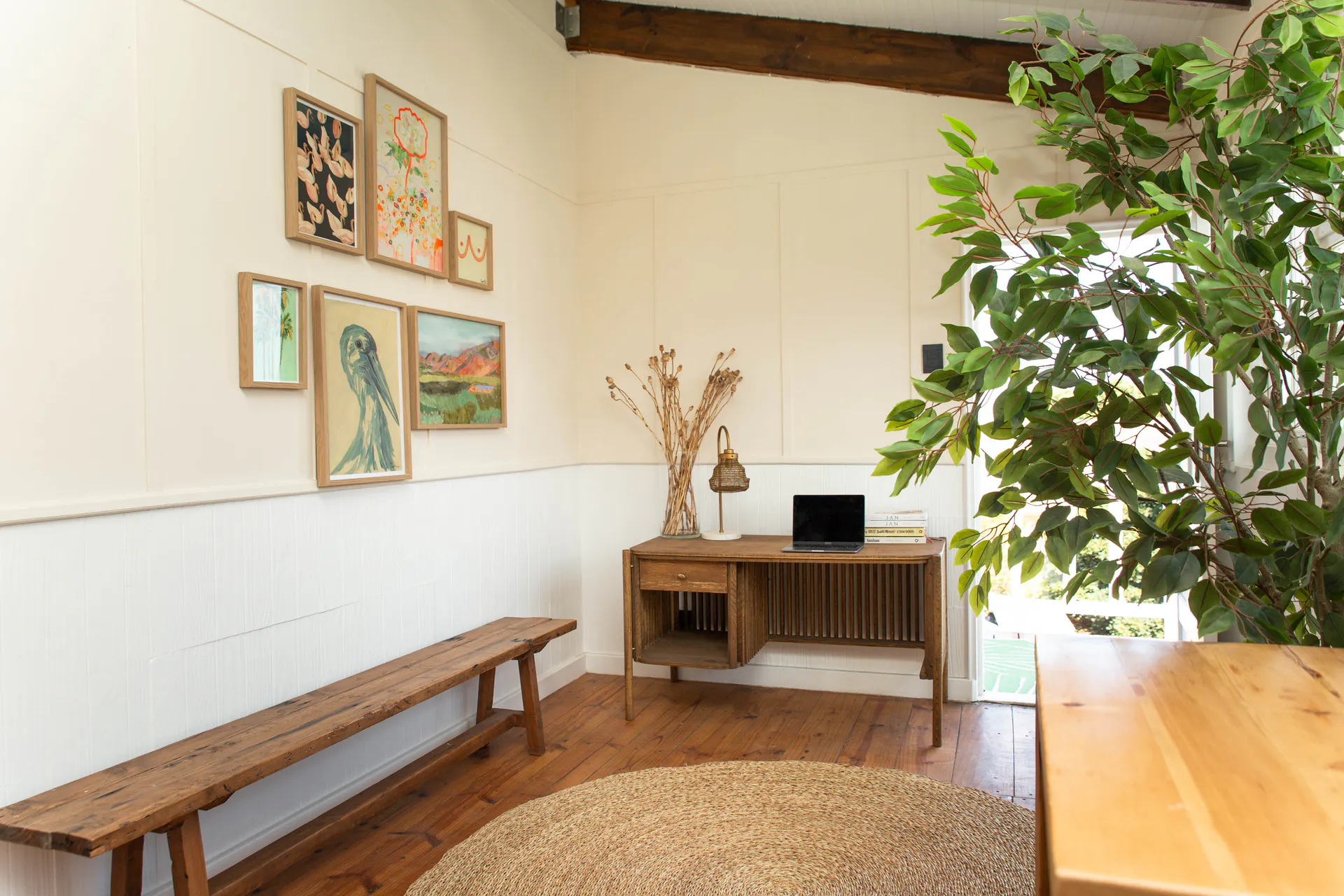 Workspace and gallery wall in the Sea Facing Apartment