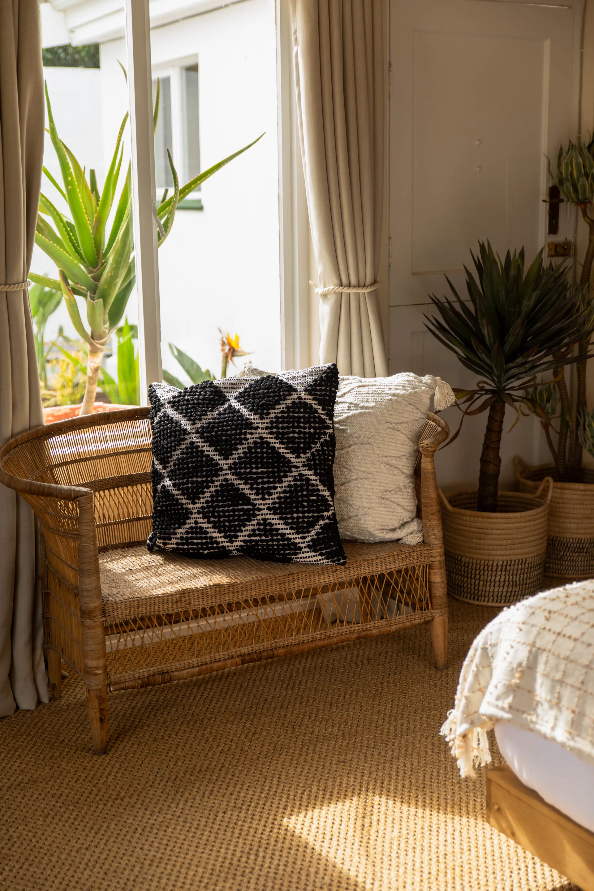 Rattan sofa at the Standard Garden Room garden window