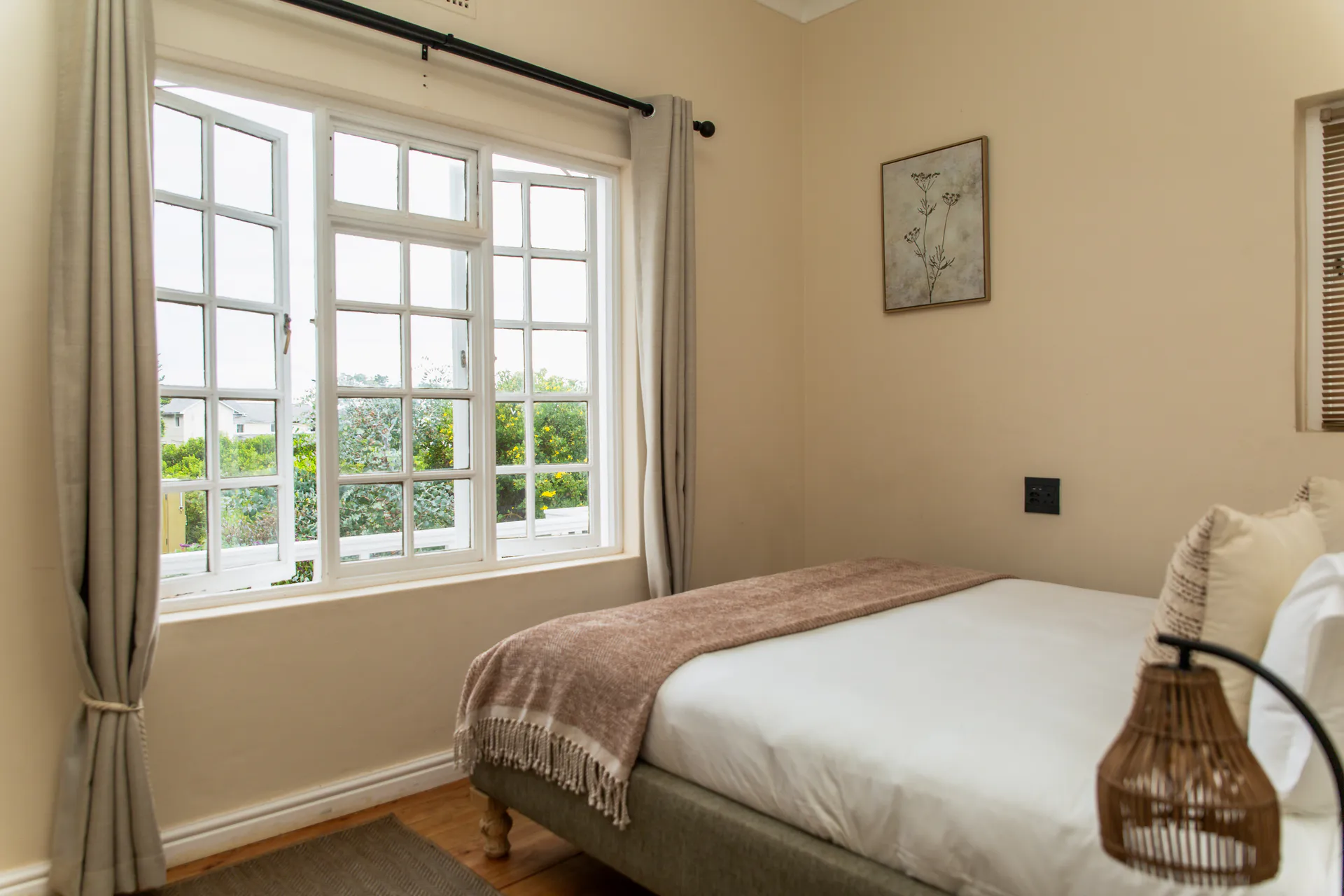 Ground Floor Apartment bedroom with the garden window open