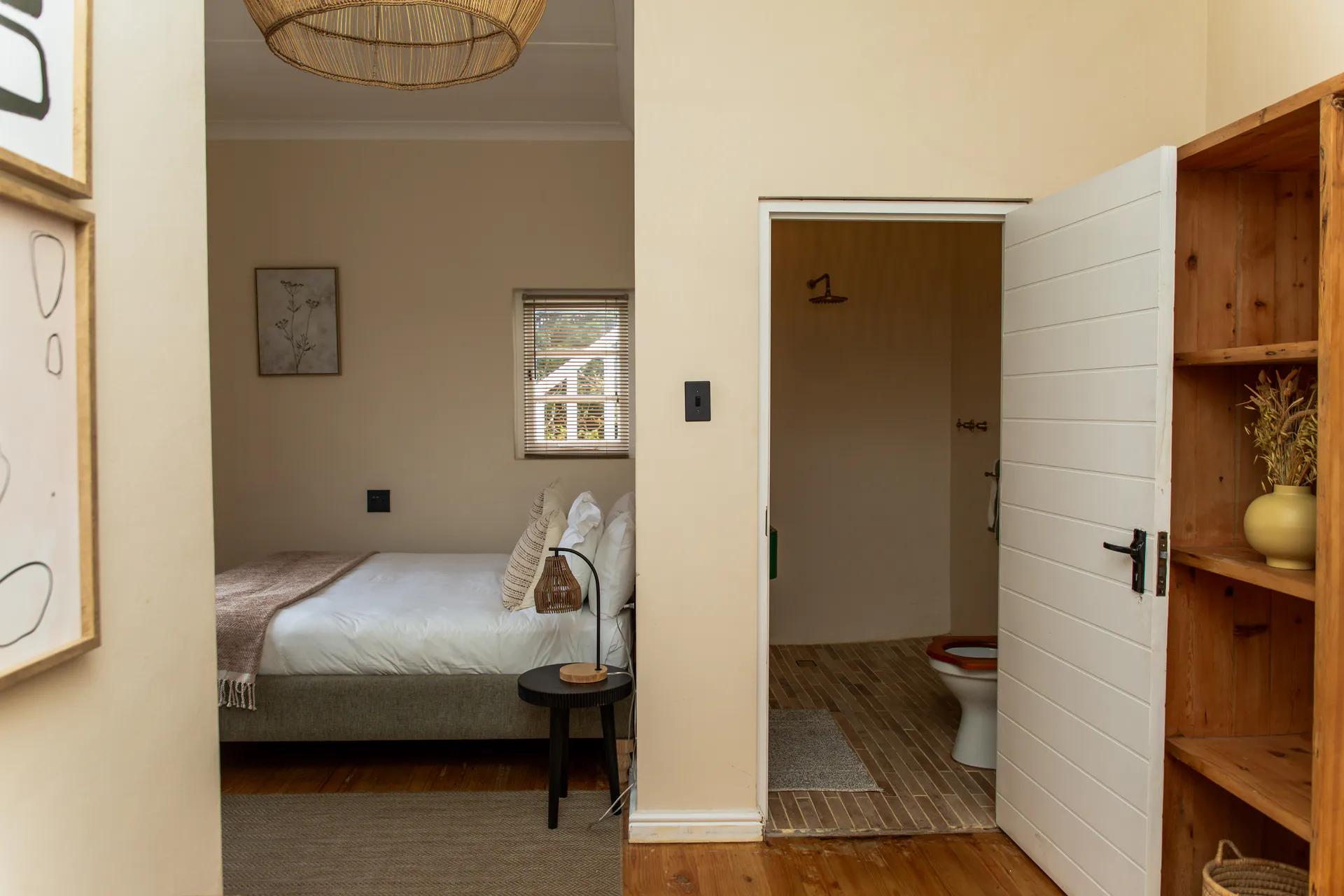 Ground Floor Apartment bedroom with the en-suite door open