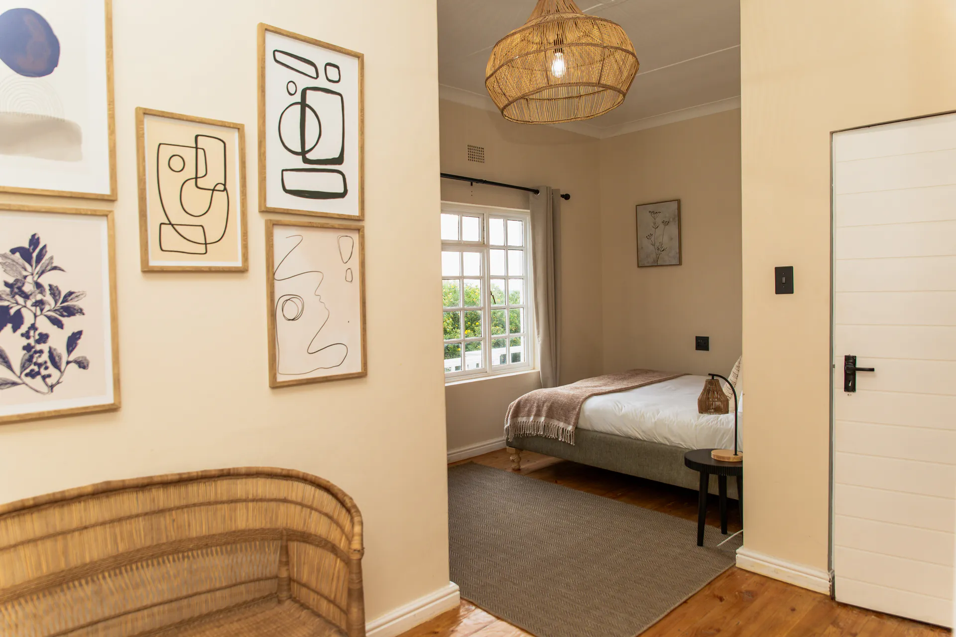 Gallery wall and bedroom doorway in the Ground Floor Apartment