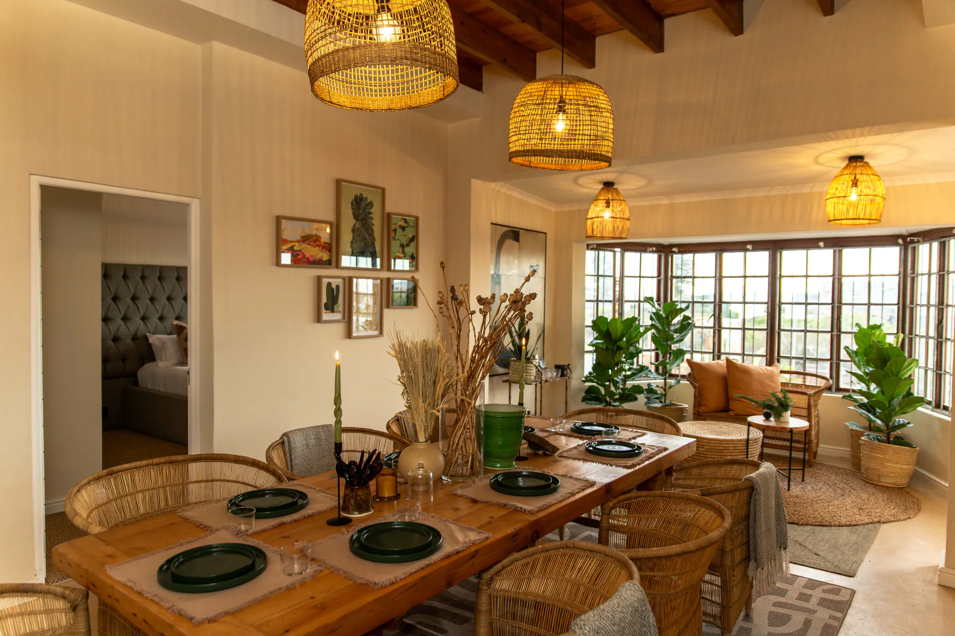 Dining table and bay-window sitting nook in the Ground Floor Apartment