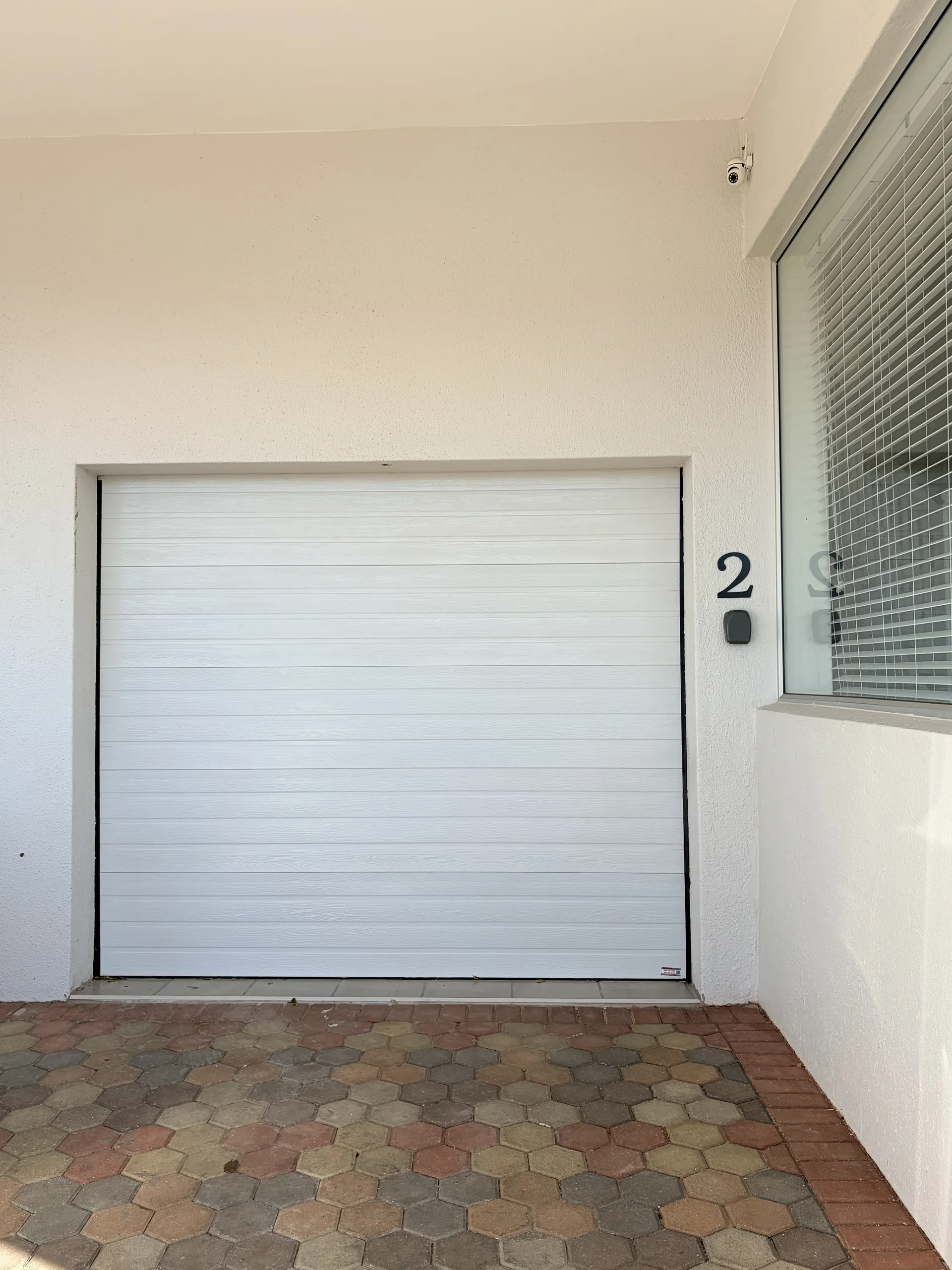 Garage door marked 2 at Coastal Charm